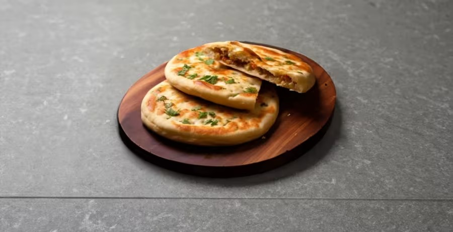 Buy 1 Cheese Masala Stuffed Kulcha Sandwich & Get 1 Coke (200 Ml) Free